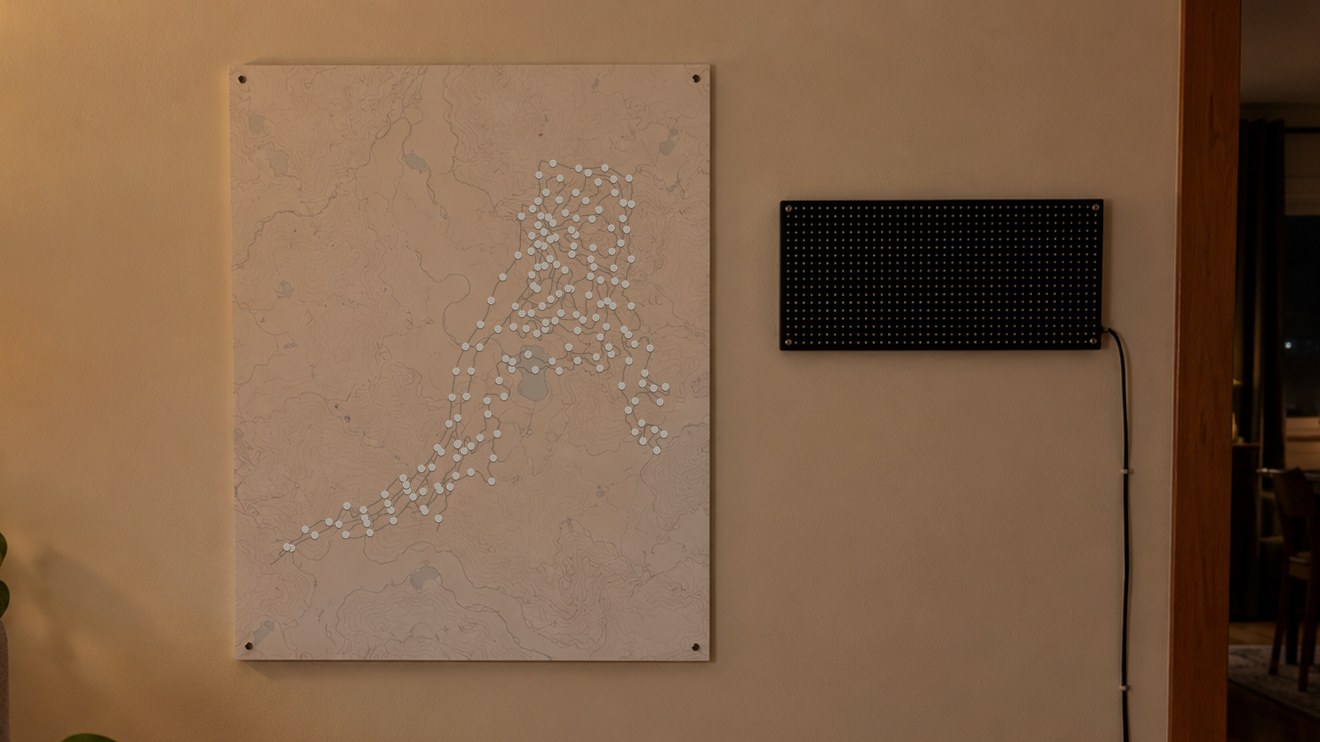 Illustration of the planned build: The map and the sign hung side by side on a wall, lights off.
